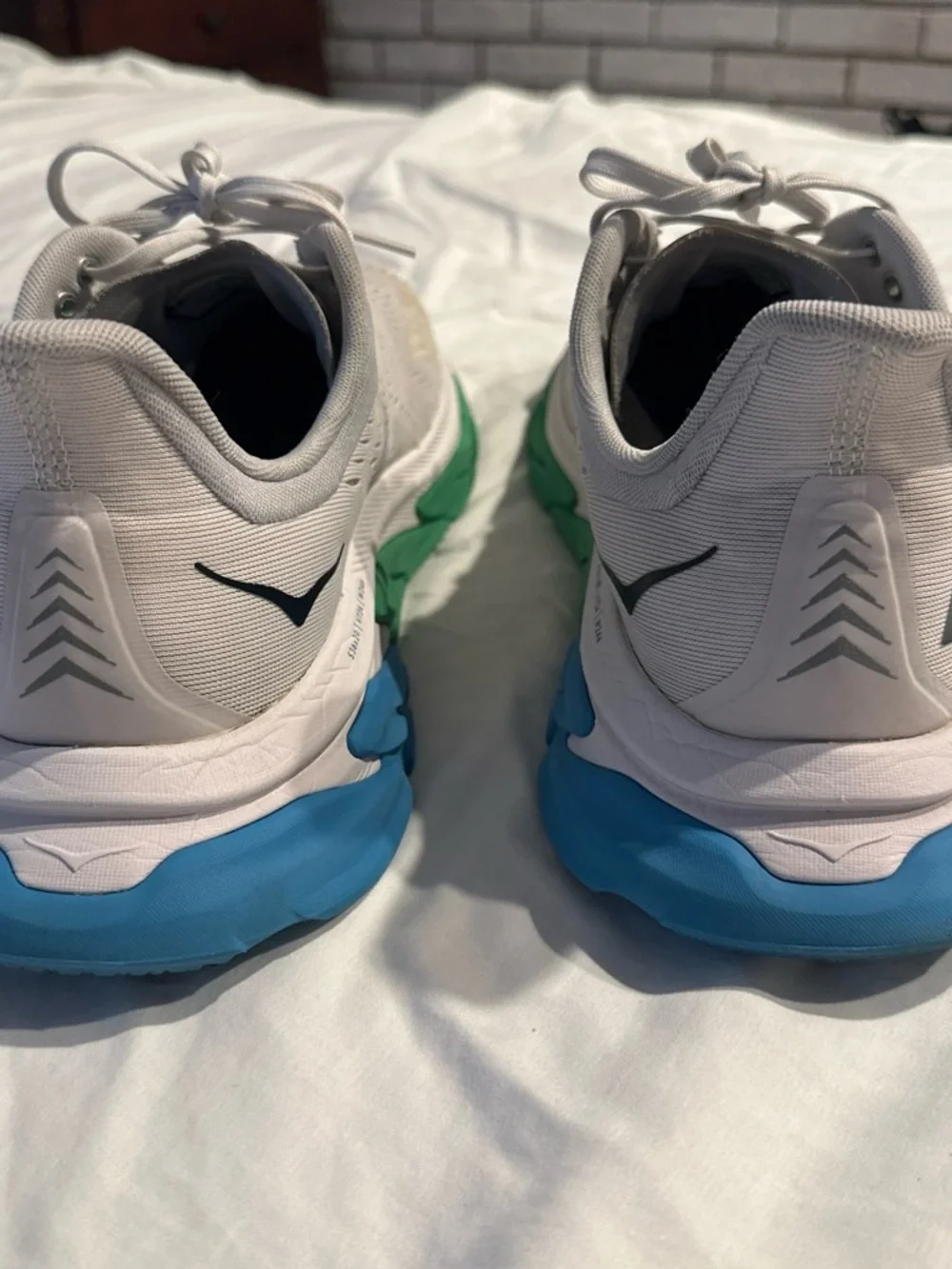 Hoka Men's White Running Shoes with Green and Blue Soles